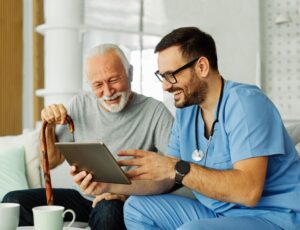 healthcare professional shows patient how to use website