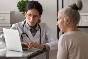 patient and doctor using healthcare website