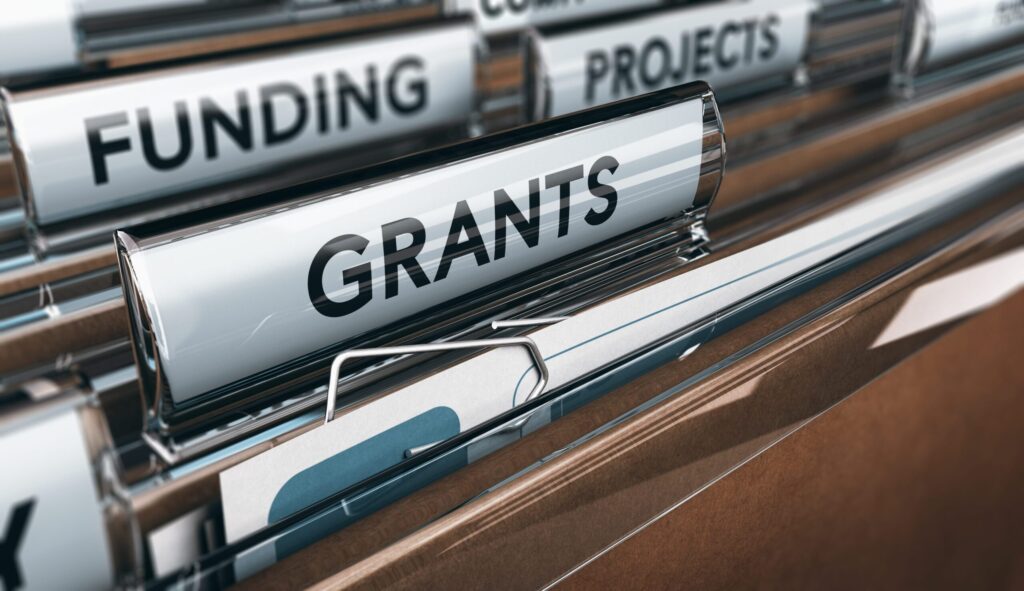 file tabs for grants and funding for a new rehab facility